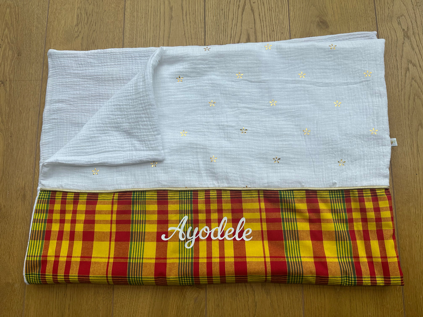 Couverture bébé en madras et double gaze de coton "Carambole"